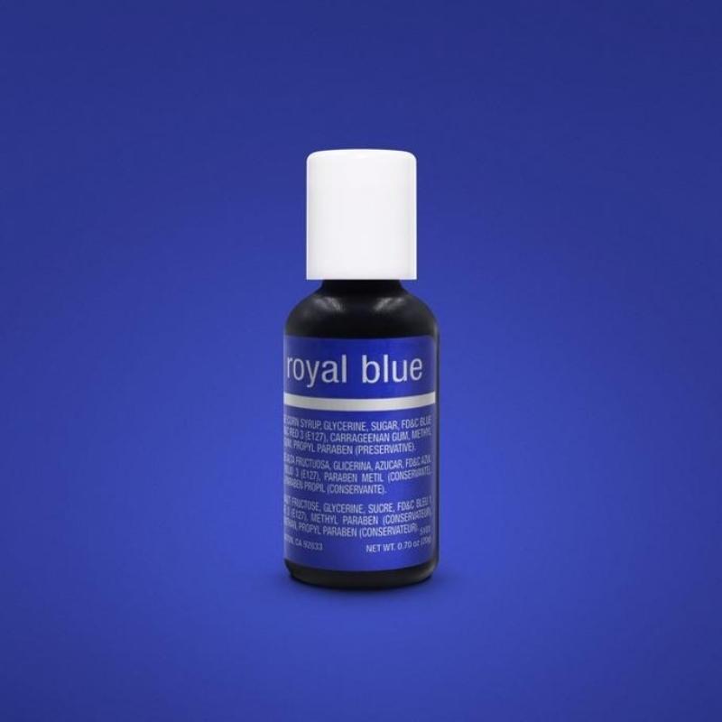 royal blue background with small bottle of royal blue food coloring