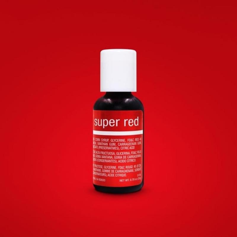 Super red bottle of food gel colouring on red background