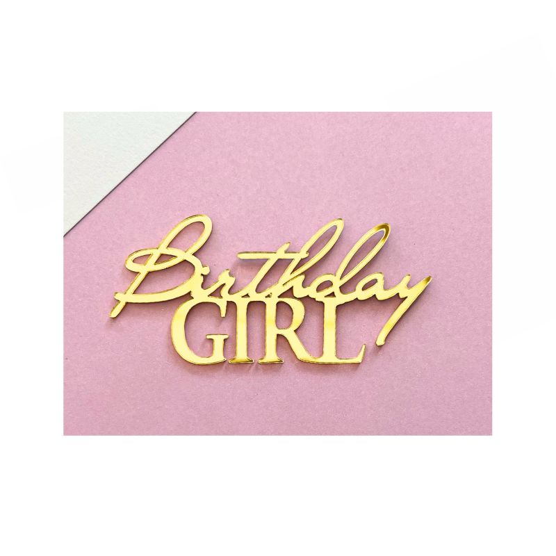 Birthday girl cake charm in gold on pink background