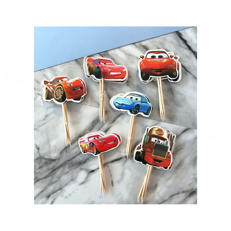 6 different cars on tooth picks for putting on cupcakes and they are red and one blue car