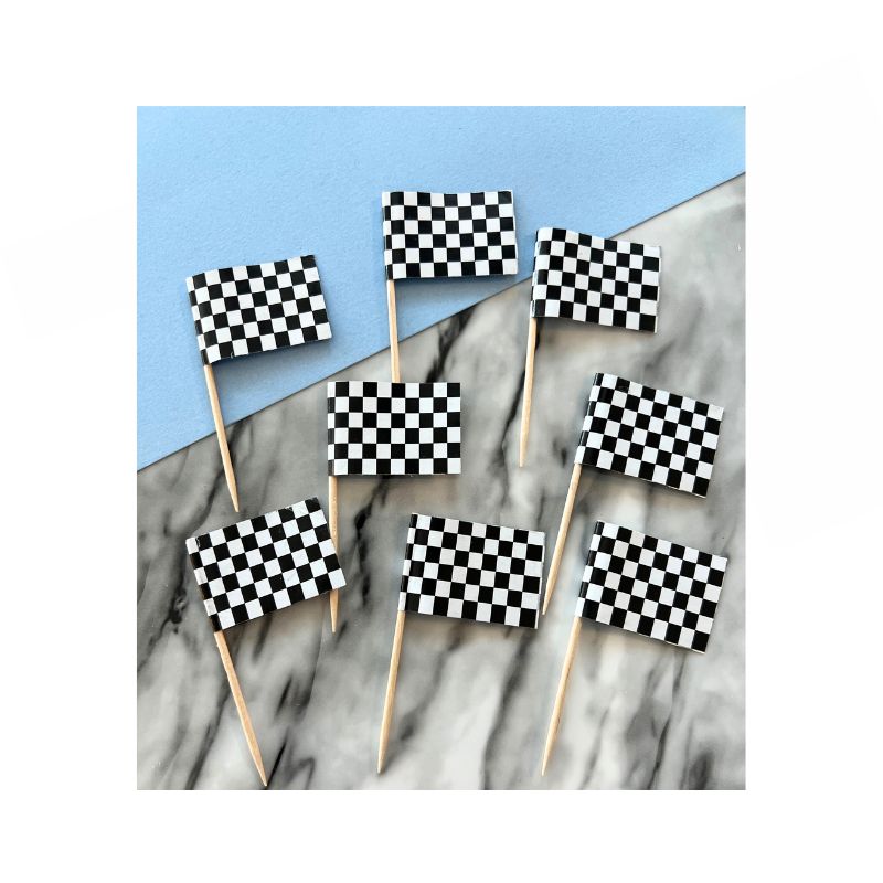 8 race car flags that are checkered black and white on sticks for cupcakes 