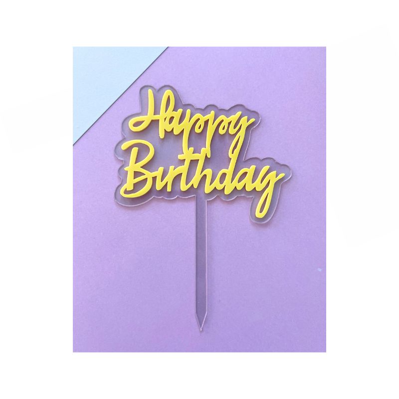 Pastel Yellow happy birthday cake topper on purple background