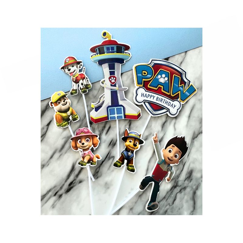 4 different paw patrol dogs and one Ryder and one tower and one tower on sticks for cake