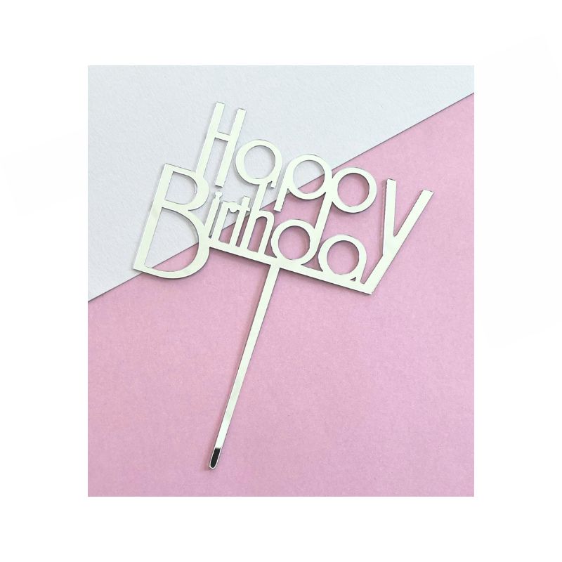 The "Silver Happy Birthday" cake topper features the words "Happy Birthday" written in an elegant, cursive font. 