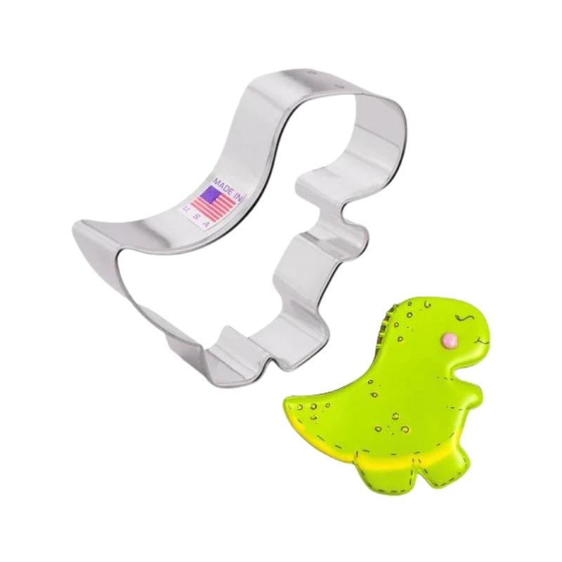 Baby t rex dinosaur cookie cutter used for making dino themed decorated cookies