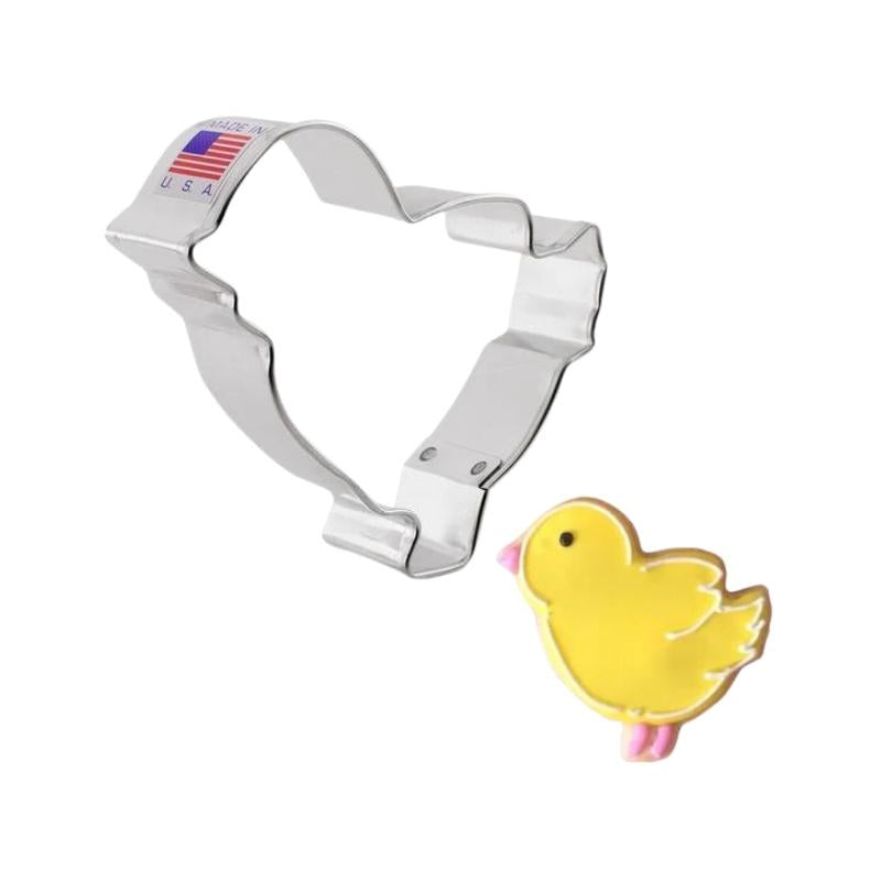 Small chickadee cookie cutter that is used to cut cookie dough for farm animal cookies