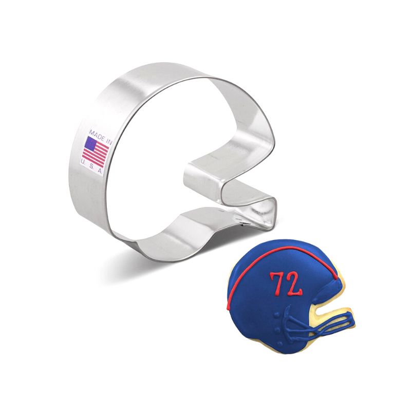 Stainless steel with made in the usa America flag cookie cutter next to a navy blue decorated sugar cookie with red 72 written on