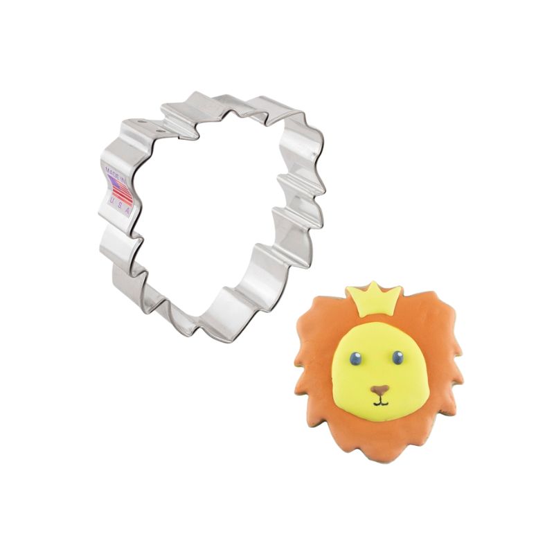 Stainless steel cookie cutter made in the USA and in the shape of a Lion head and cookie decorated with orange and yellow icing