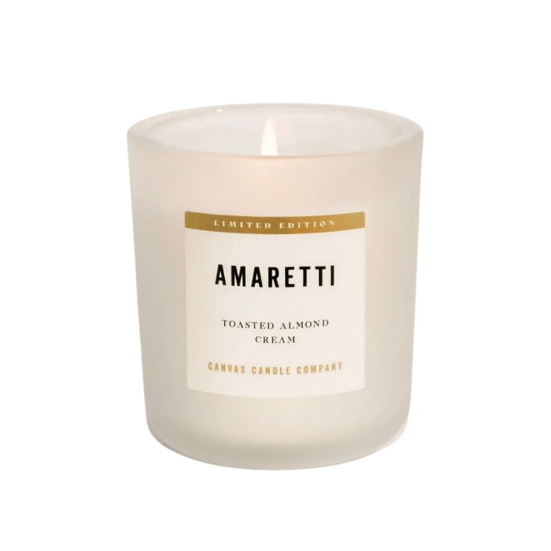 Glass candle with fire with label amaretti