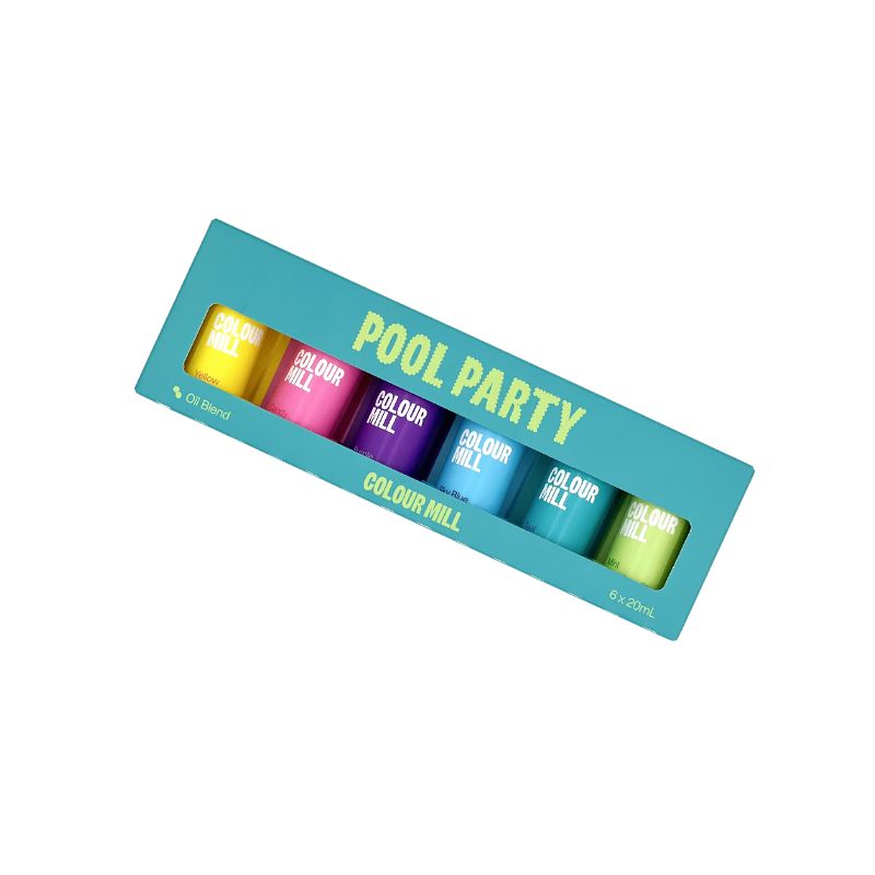 Teal box of food colours with pool party colour mill written on top