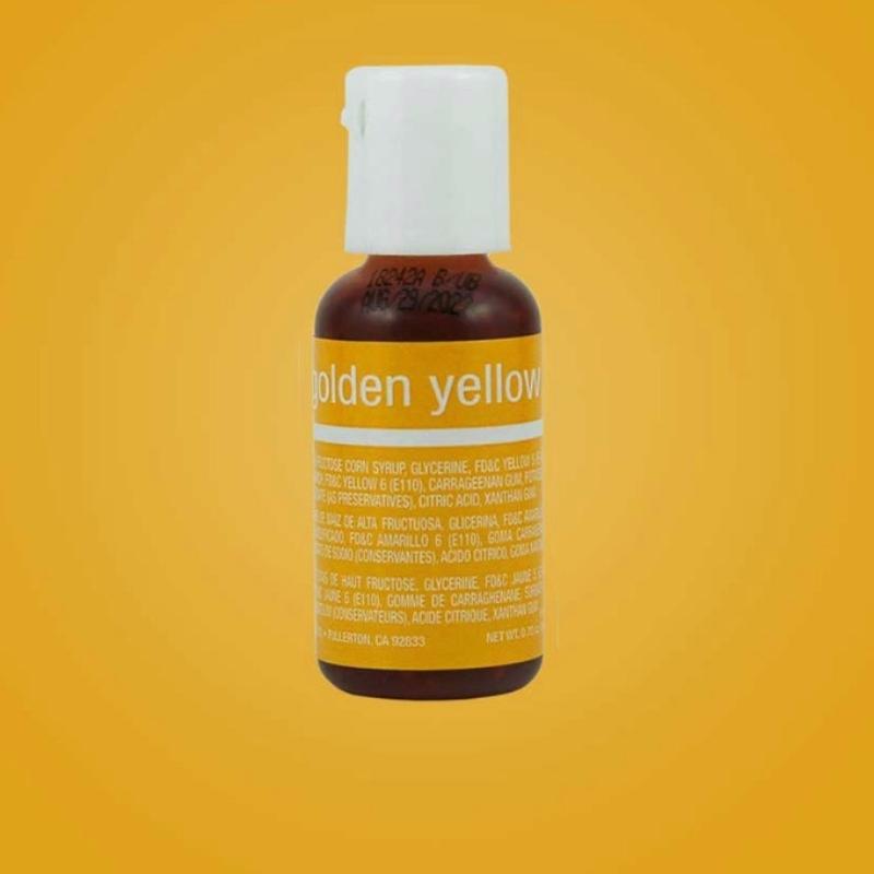 Golden yellow liquid food color bottle on orange yellow background