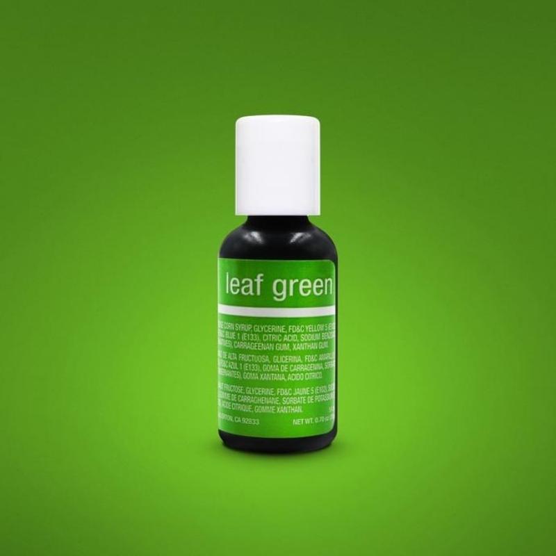 small bottle of leaf green food gel coloring with white lid and on green background