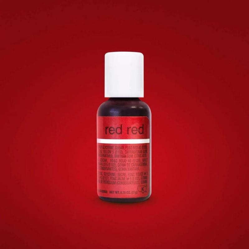 red red food gel colour bottle on red background