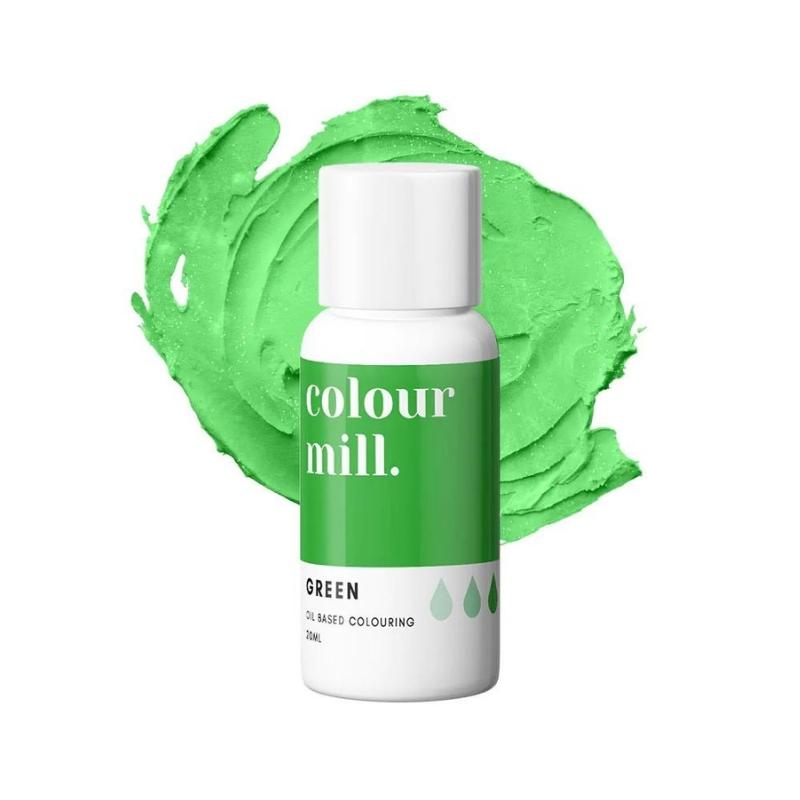 Bottle of green colour mill oil based coloring with green buttercream background