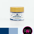 Container with gold lid and white label that has roxy & rich Fondust Wedgwood blue with different shades of Wedgwood on the bottom